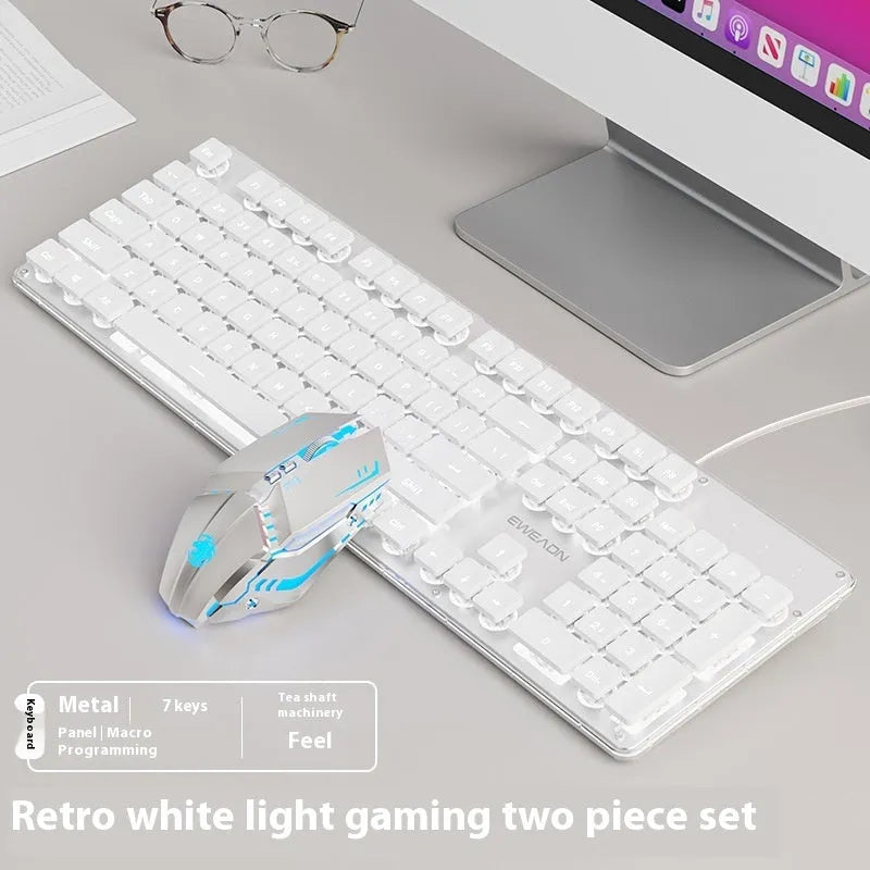 Wired mute keyboard with mechanical feel keys, shown in a Metal Black case with blue LED backlighting.