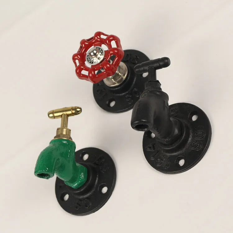 Metal wall hook in water pipe style with polished finish, shown in black, green, and red colour options.