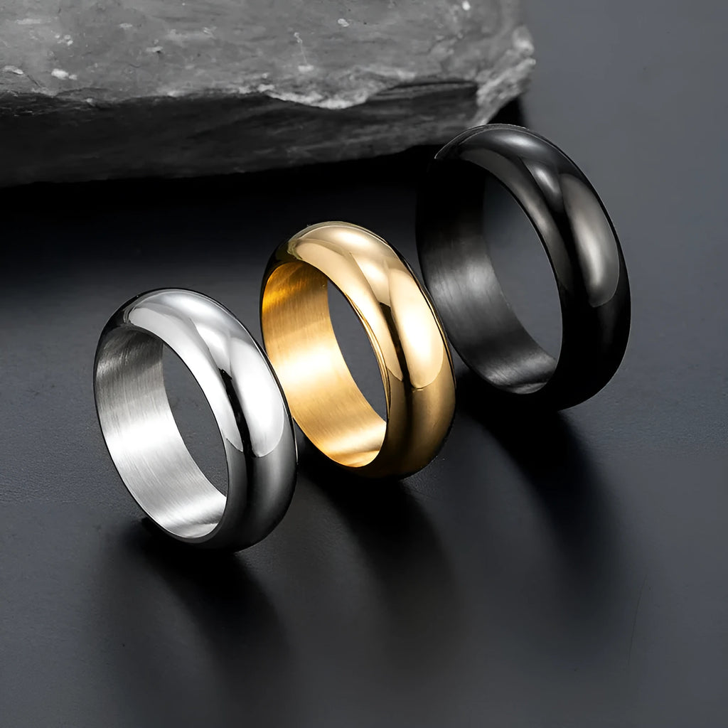Glossy electroplated titanium steel ring in gold, black or steel colour showing shiny band design.