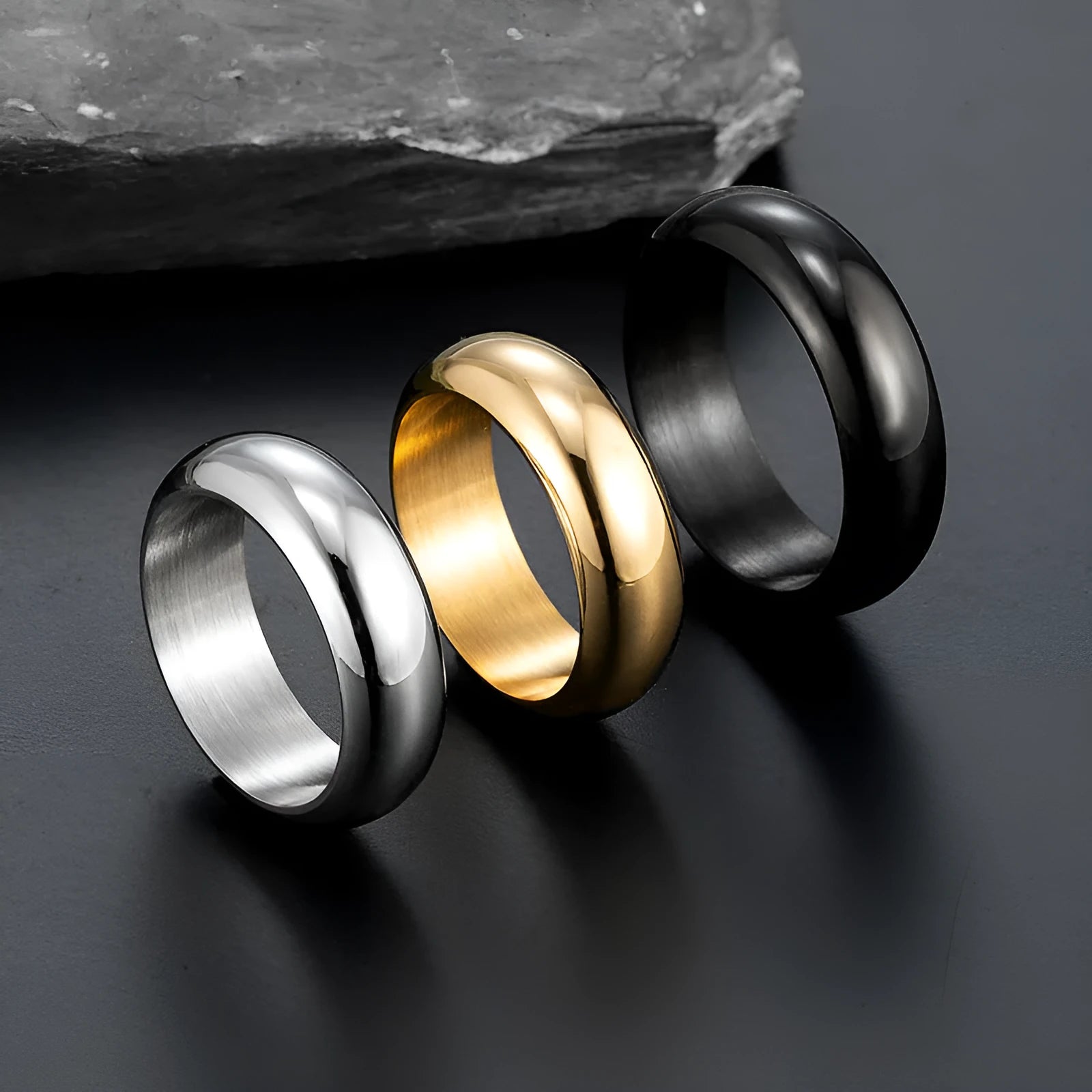 Glossy electroplated titanium steel ring in gold, black or steel colour showing shiny band design.