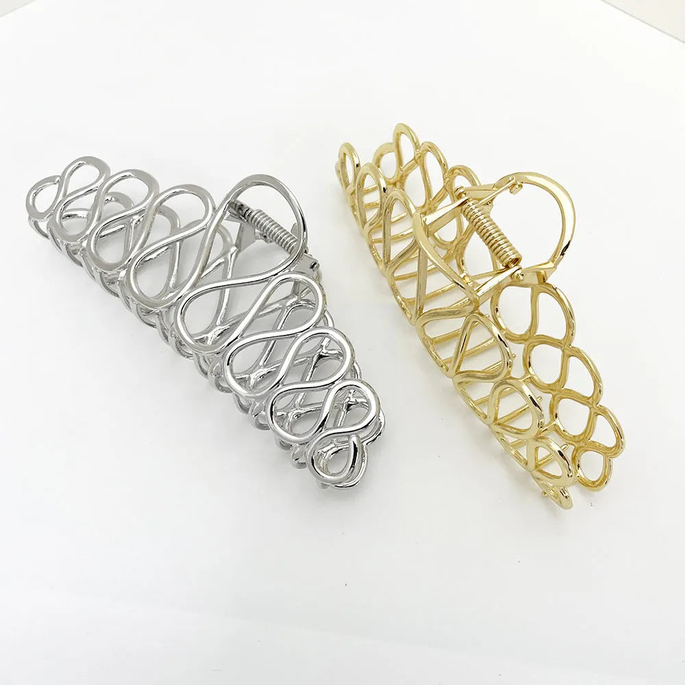 Large gold or silver electroplated alloy hair clip with tassel detail for thick hair updos