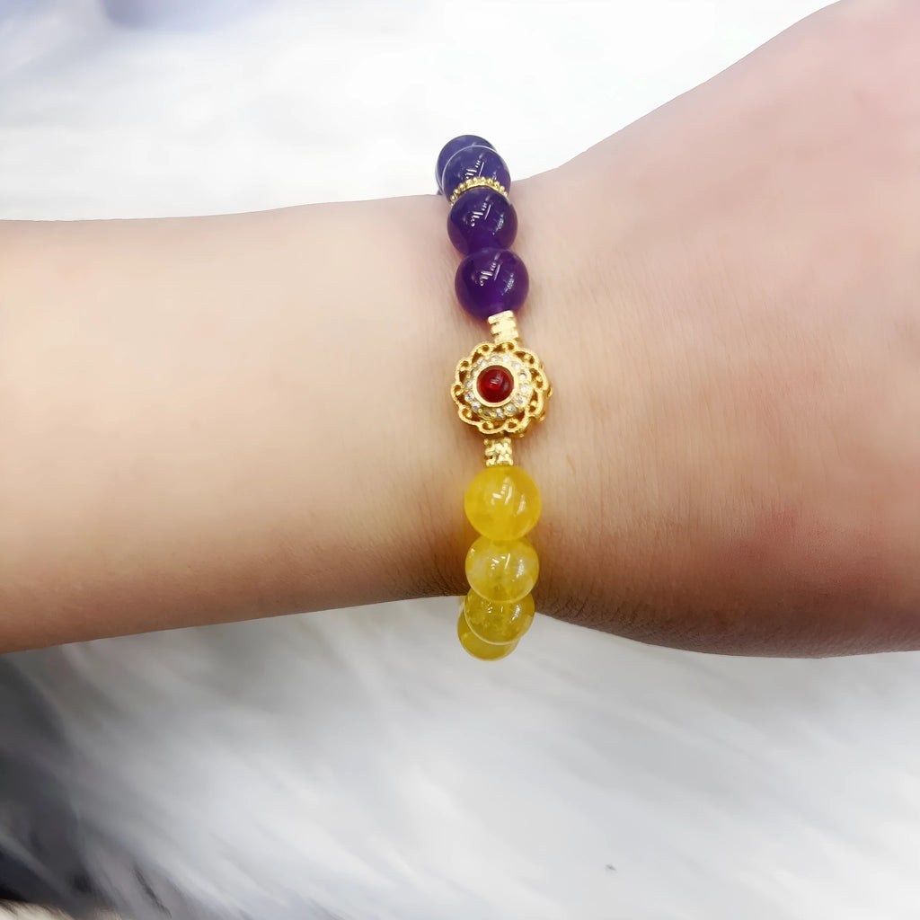 Handmade women's amethyst crystal bracelet with yellow and purple colour combination
