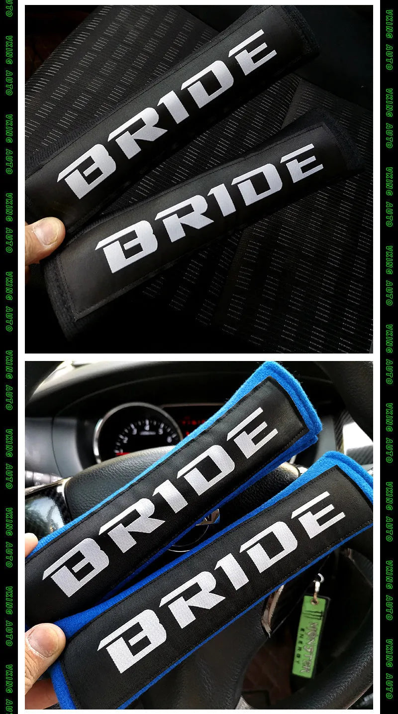 Pair of black car seat belt shoulder pads with embroidery, showing dimensions.