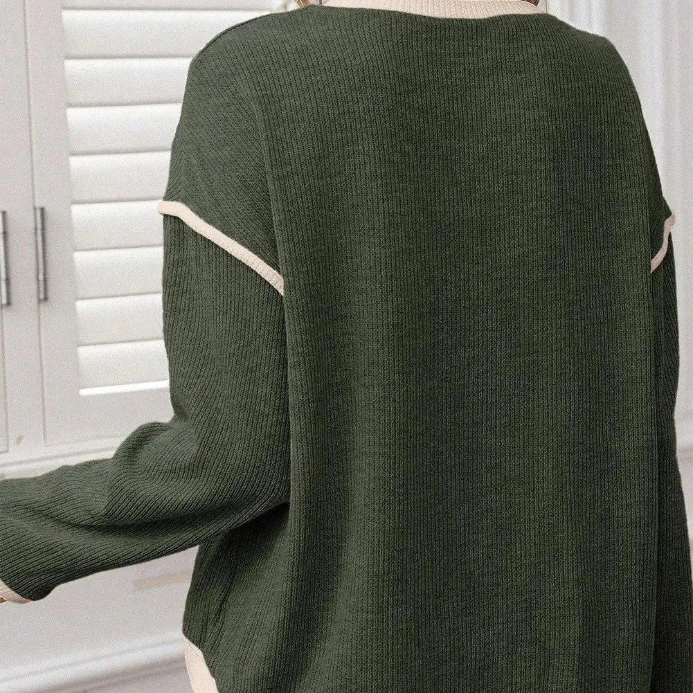 Women's knit drop shoulder top with four leaf clover design and contrast colour trim