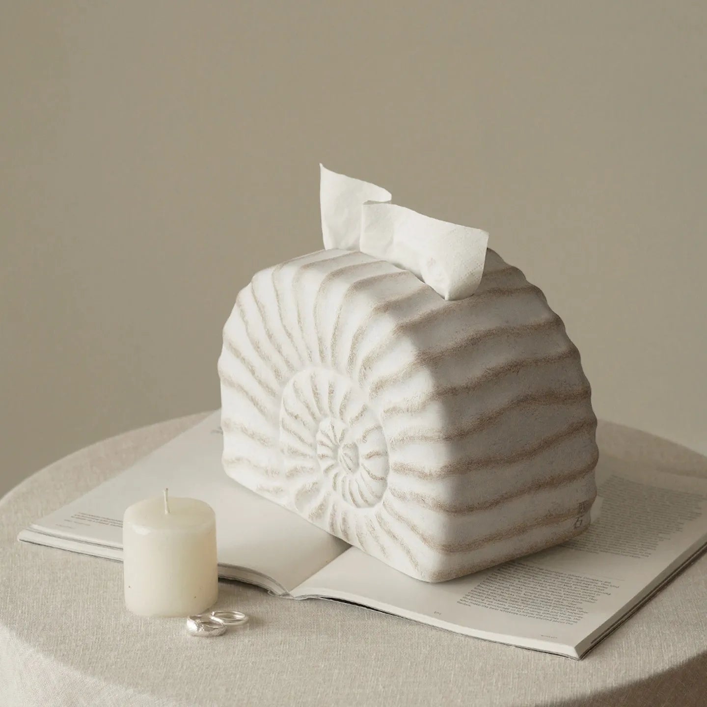 White resin tissue box with conch shell design, modern style, 24cm wide.