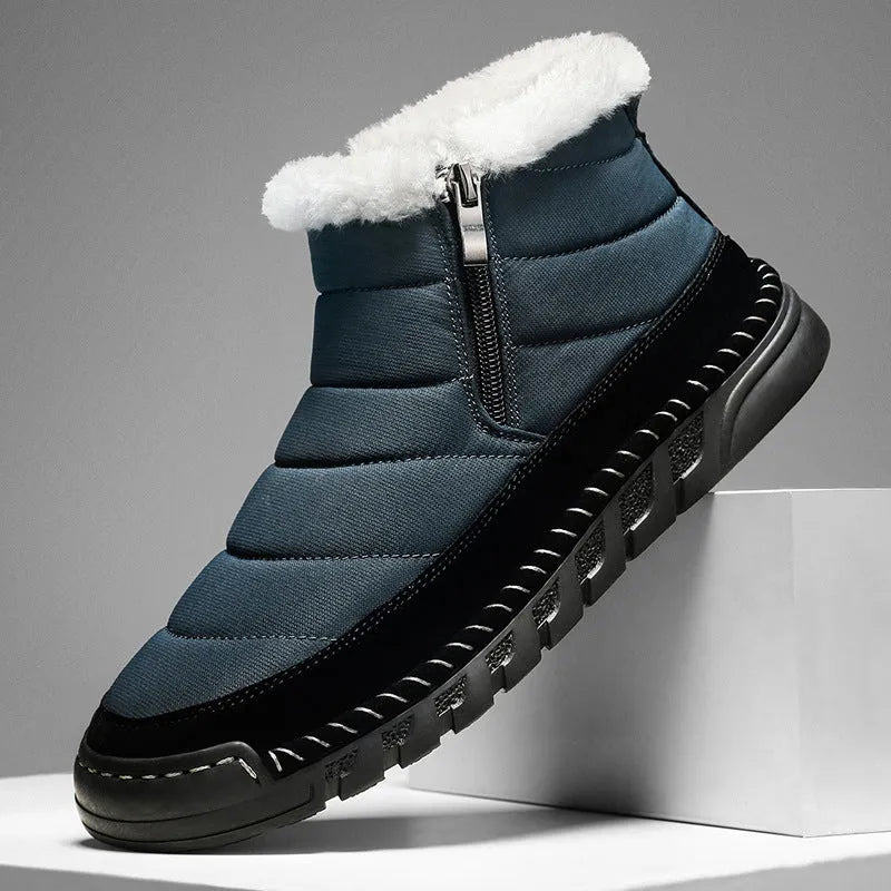 Men's plus size snow boot in blue with round toe and flat heel on a non-slip rubber sole.