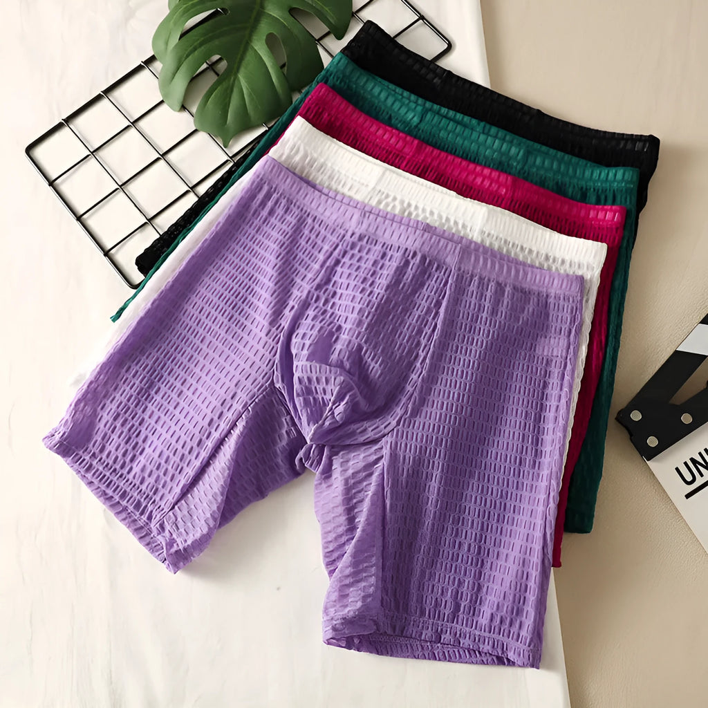 Men's solid colour lace boxer briefs with a lengthened hip-lifting design on a white background.
