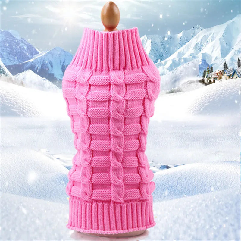 Wool knitted dog sweater with twisted rope detail in red on a mannequin, size chart showing XS to XL measurements.