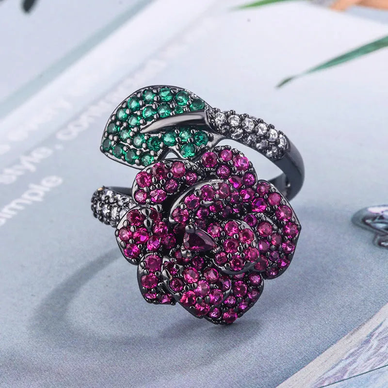 Black gold geometric flower ring with red simulation corundum stones