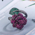 Black gold geometric flower ring with red simulation corundum stones