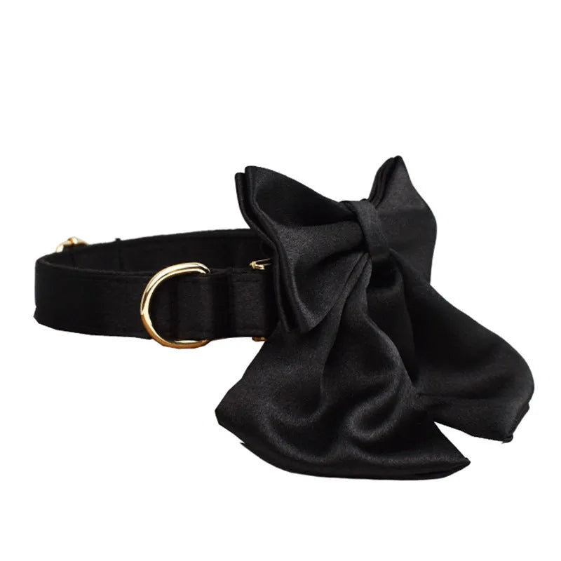 Cloth dog collar, leash, bow, and vest set shown in multiple sizes for pets.