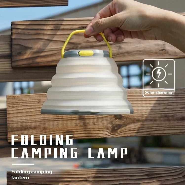White portable camping lamp with large capacity battery and a single control button.