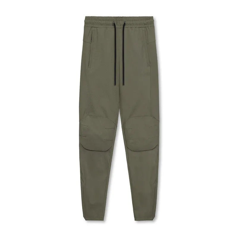 Men's loose grey quick-dry fitness trousers with ankle-tied cuffs for running and gym workouts
