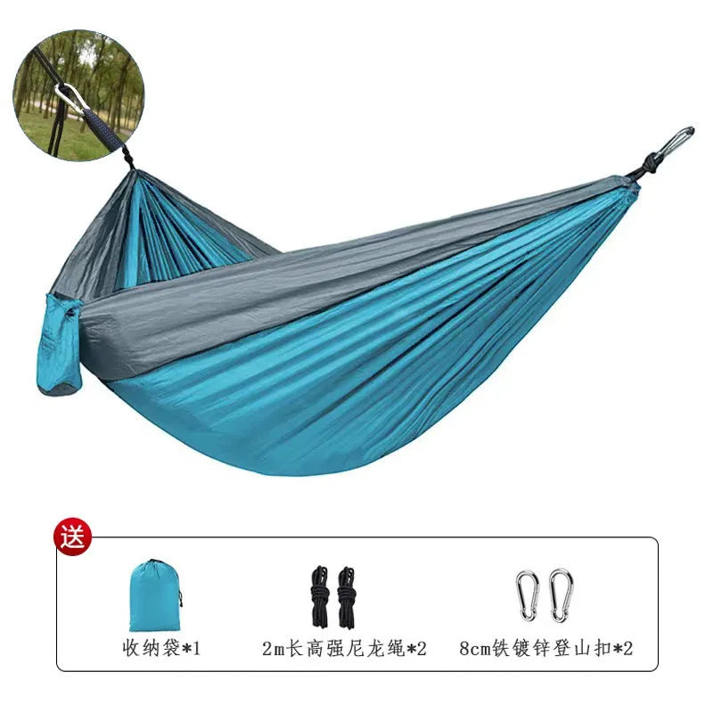 Blue nylon parachute cloth outdoor hammock with 300 kg capacity and 270x140 cm dimensions