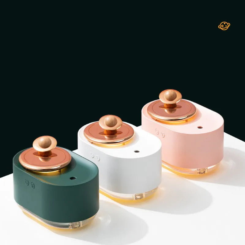 Rotating planet desktop humidifier with night light in green colour showing USB charging port and water tank