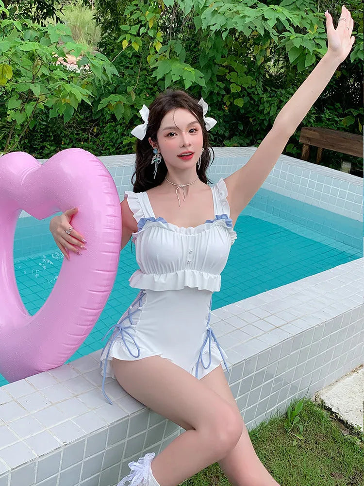 Women's milky white backless one-piece swimsuit made from nylon with polyester lining