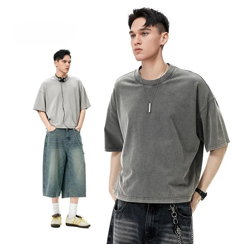 Men's cotton washed-out vintage t-shirt in khaki light showing drop-shoulder sleeve and loose fit
