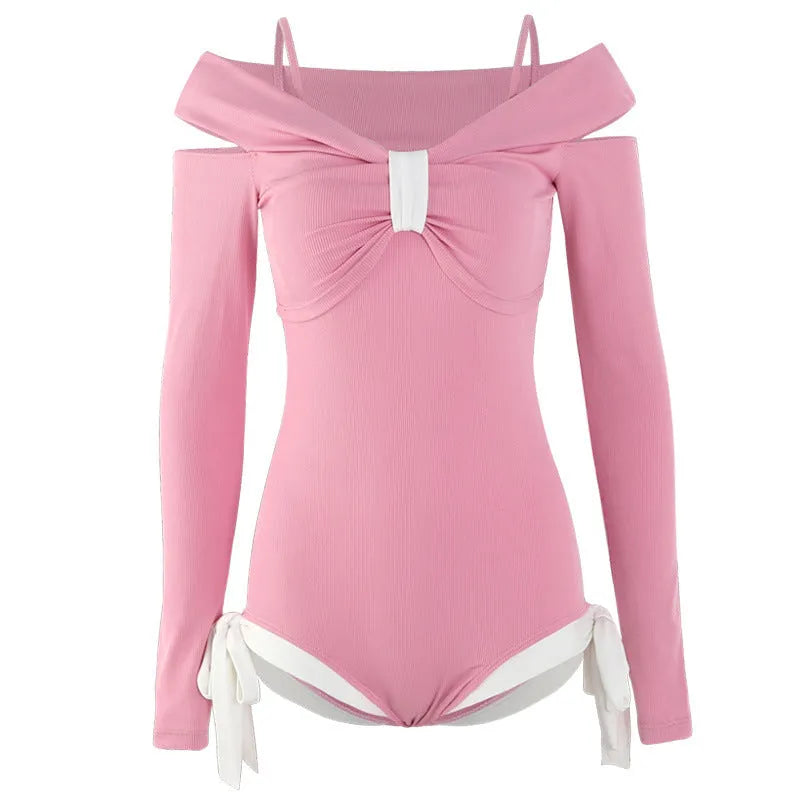 Women's long-sleeve one-piece swimsuit in pink and black colours