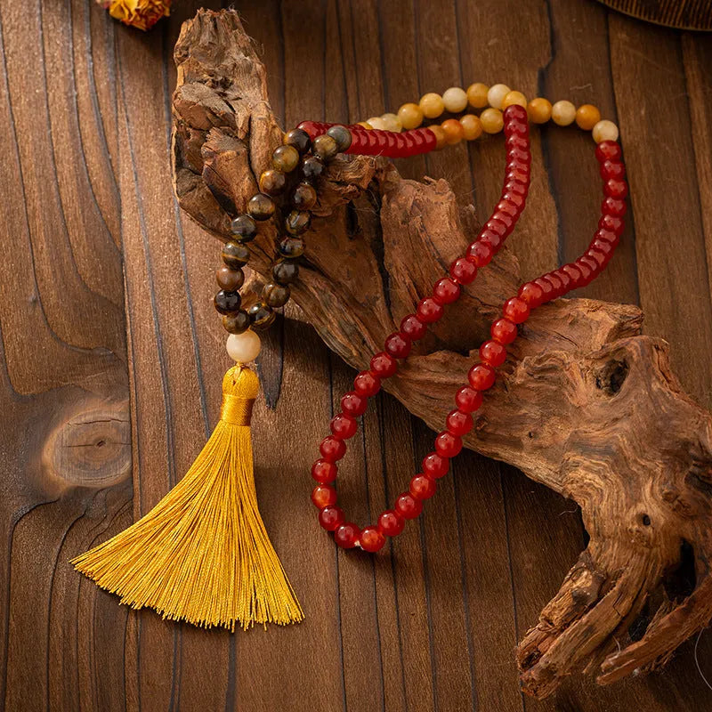 Vintage bohemian style beaded sweater chain with tassel detail and matching bracelet