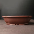 Handmade purple clay Chinese bonsai basin with classical plain design measuring 25x20x7cm