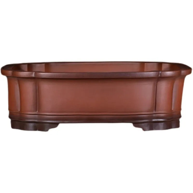 Antique jade Chinese style purple clay flowerpot with golden marble patterning, oval shape, 71cm long.