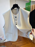Beige loose-fitting waistcoat dress with bandage styling and pocket detail
