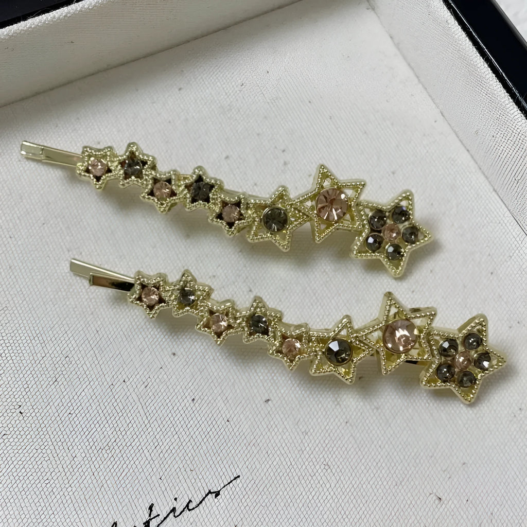 Gold Korean-style alloy hair barrettes with broken clip and star decoration.