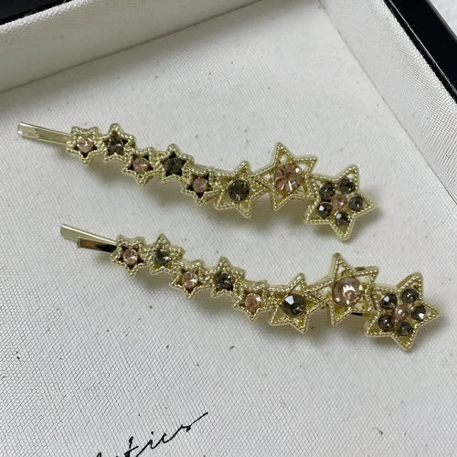 Gold Korean-style alloy hair barrettes with broken clip and star decoration.