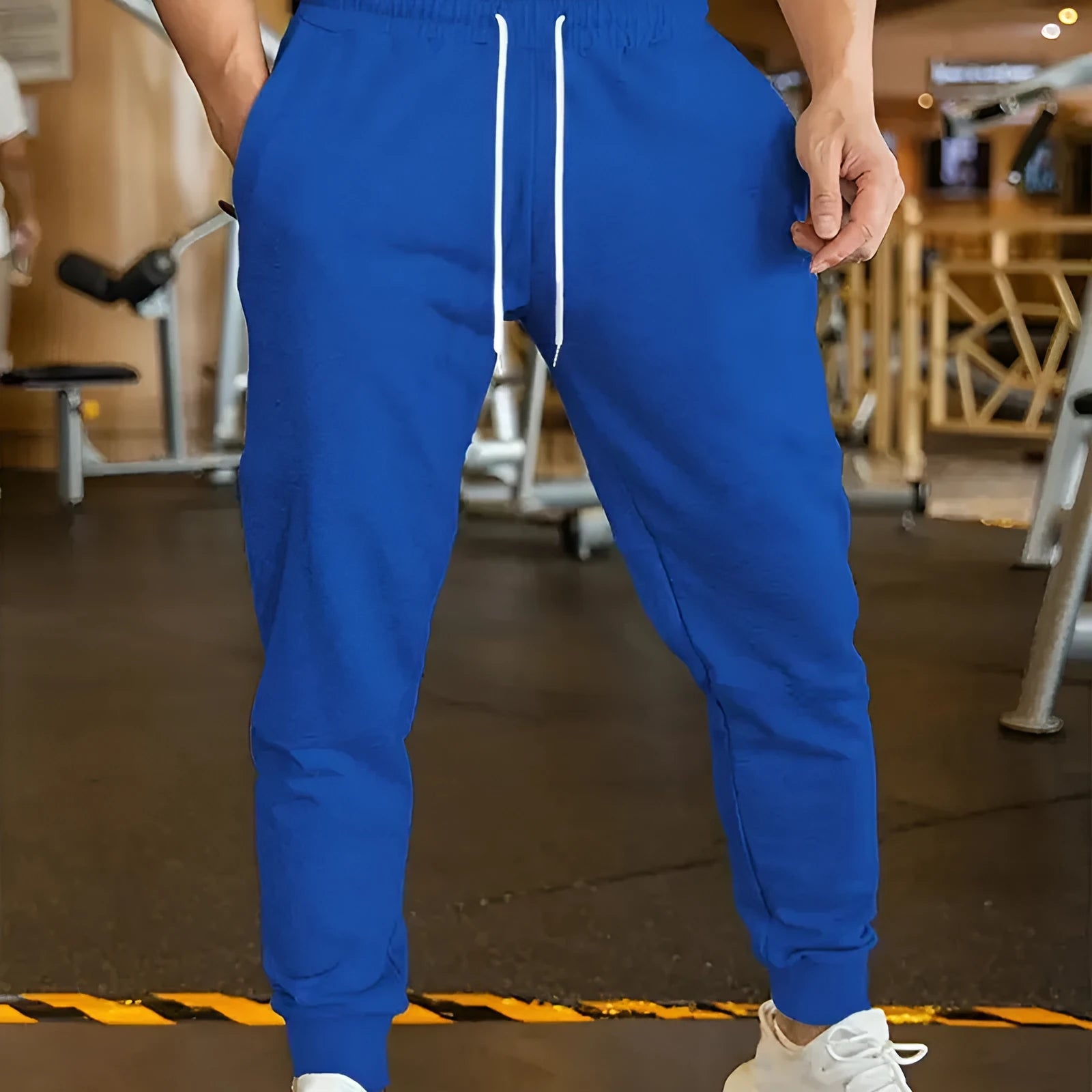 Men's linen-style leisure trousers with elastic drawstring waistband and loose fit design