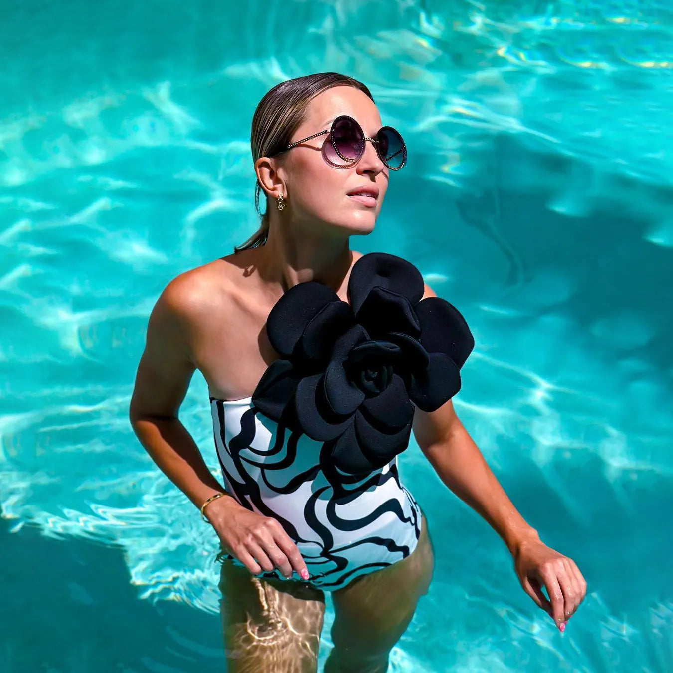 Women's one-piece swimsuit with three-dimensional floral embroidery in polyester fabric
