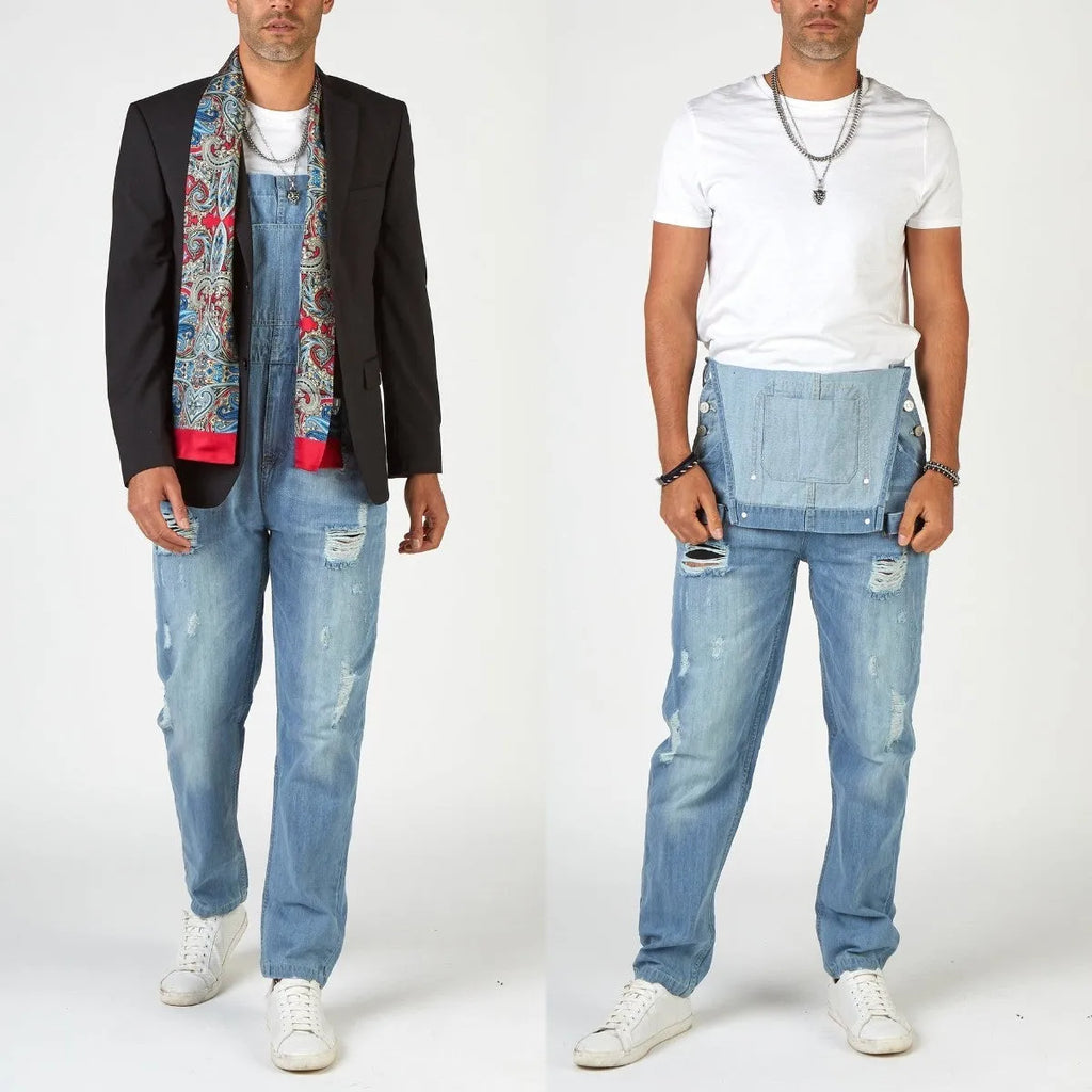 Light blue men's ripped suspender jeans with high waist and straight legs showing button fly and adjustable braces
