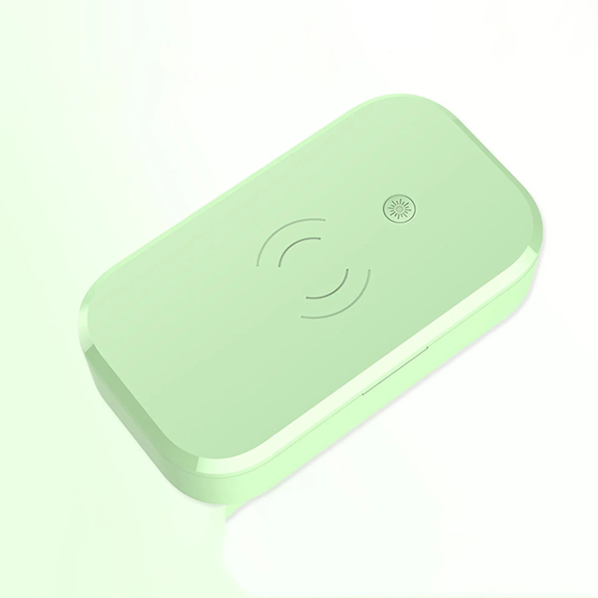 Compact white ultraviolet disinfection box with wireless charging surface for mobile phones