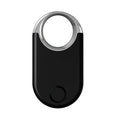 Small black and white GPS anti-lost tracking device for pets and children on a white background.