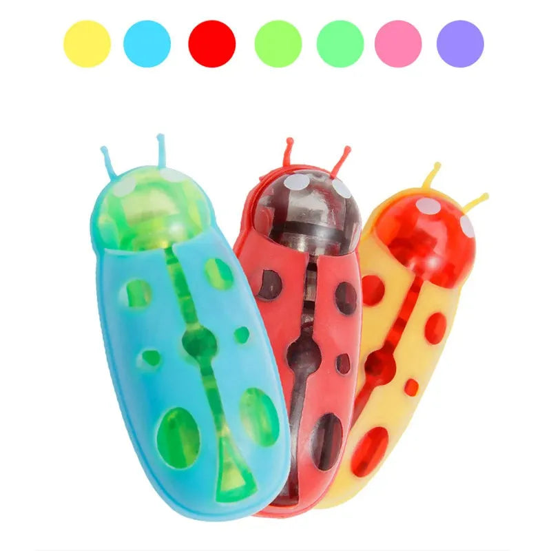 Electric ladybird beetle cat toy with self-righting feature and LR44 battery