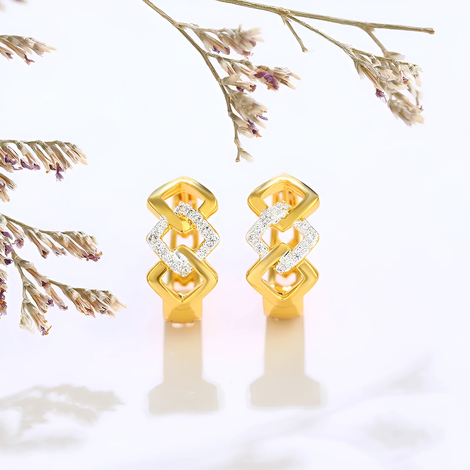 Geometric hollow-out gold electroplated alloy earrings with colour separation detail on ear clips