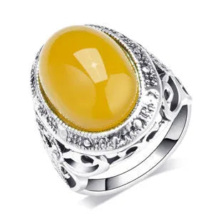 Retro geometric alloy ring with fluorescent beeswax centre and antique silver electroplated finish