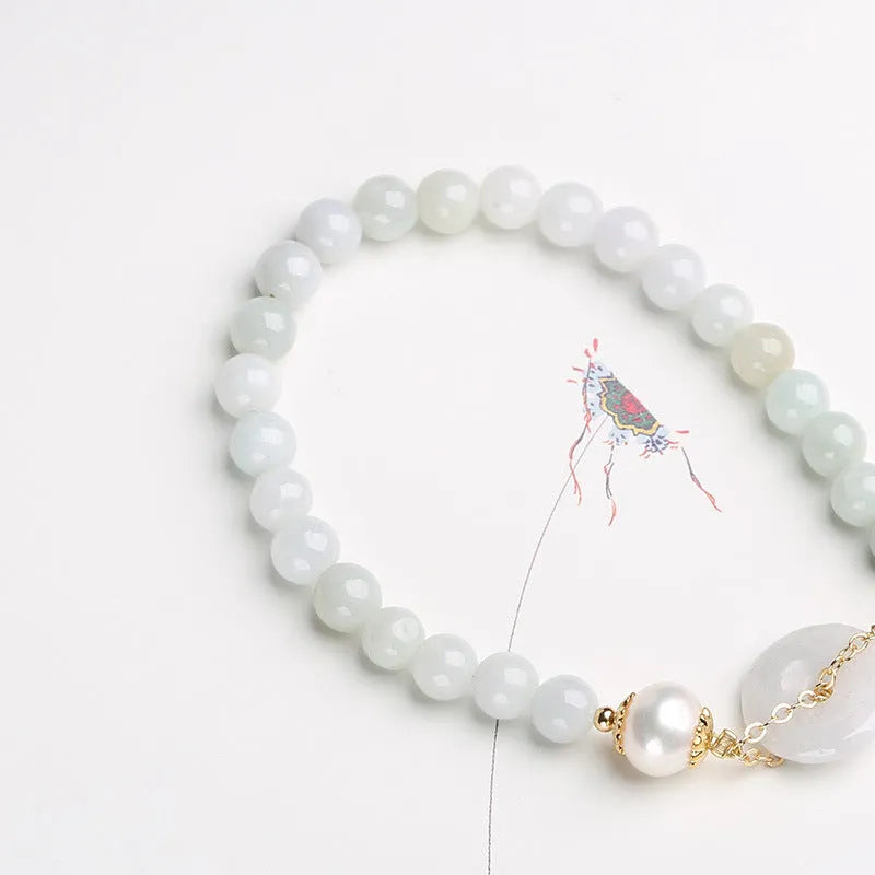 Handmade jade pearl bracelet with natural emerald peace buckle and geometric national style design