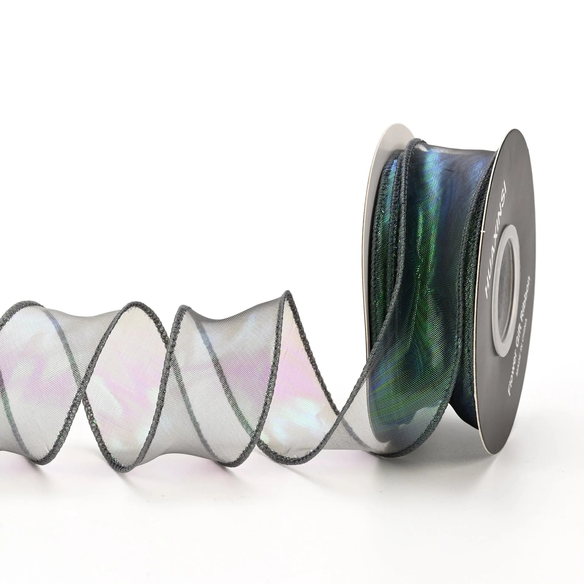 Roll of 4cm wide mesh fishtail yarn floral wave ribbon in multiple illusion colours.