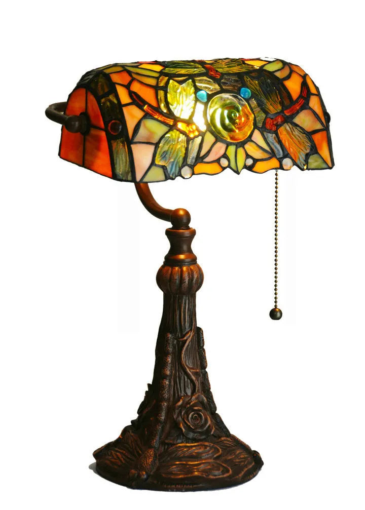 10-inch Tiffany table lamp with coloured stained glass shade and resin base on desk