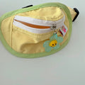 Pink, yellow, blue, and green pet carrier backpack for dogs and cats with adjustable sizing.