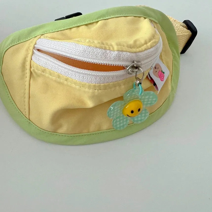 Pink, yellow, blue, and green pet carrier backpack for dogs and cats with adjustable sizing.