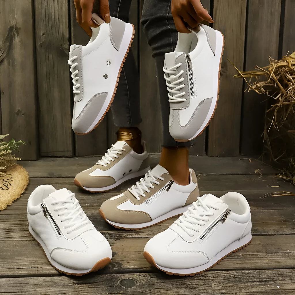 Women's flat-heeled shoes in grey, white or Champagne with artificial PU uppers and rubber soles