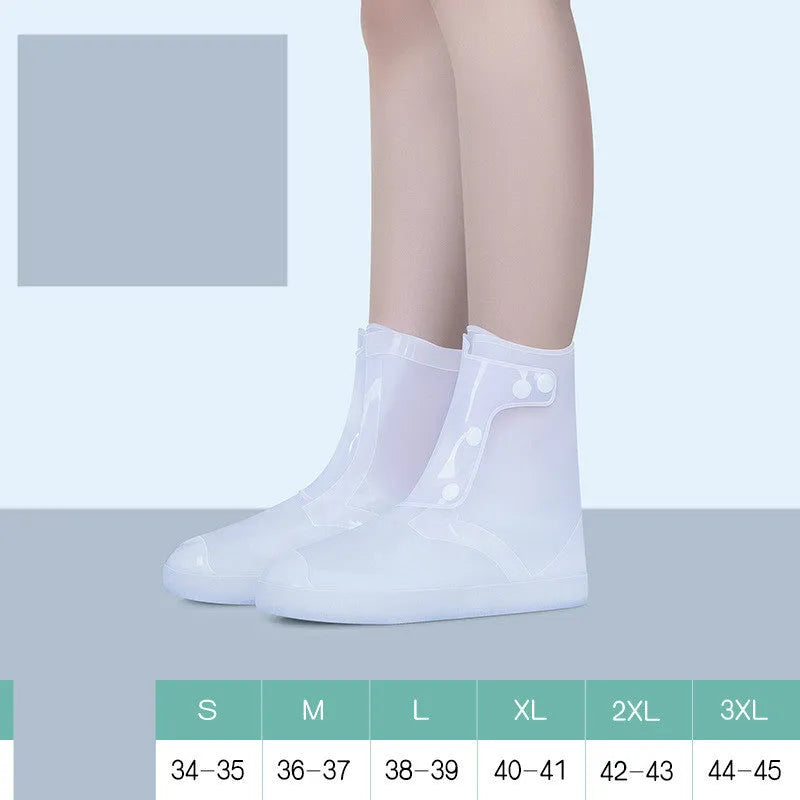 White high top PVC reusable waterproof shoe cover for women, shown on a foot.
