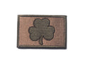Outdoor embroidered fabric badge with Velcro strip backing on a green clover design.