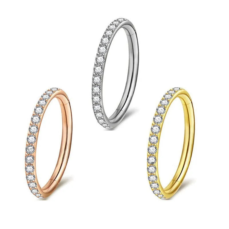 Stainless steel seamless nose ring with diamond accent in multiple colour finishes and sizes