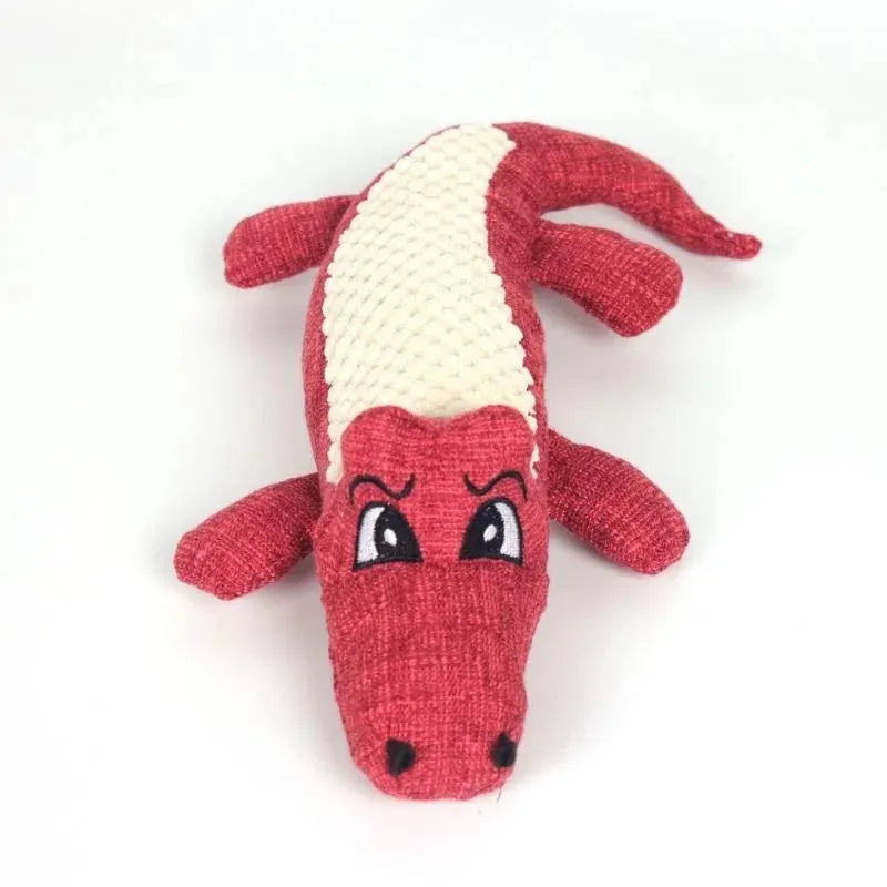 Blue, green, and red plush pet toys with corn grid texture and biting sound feature
