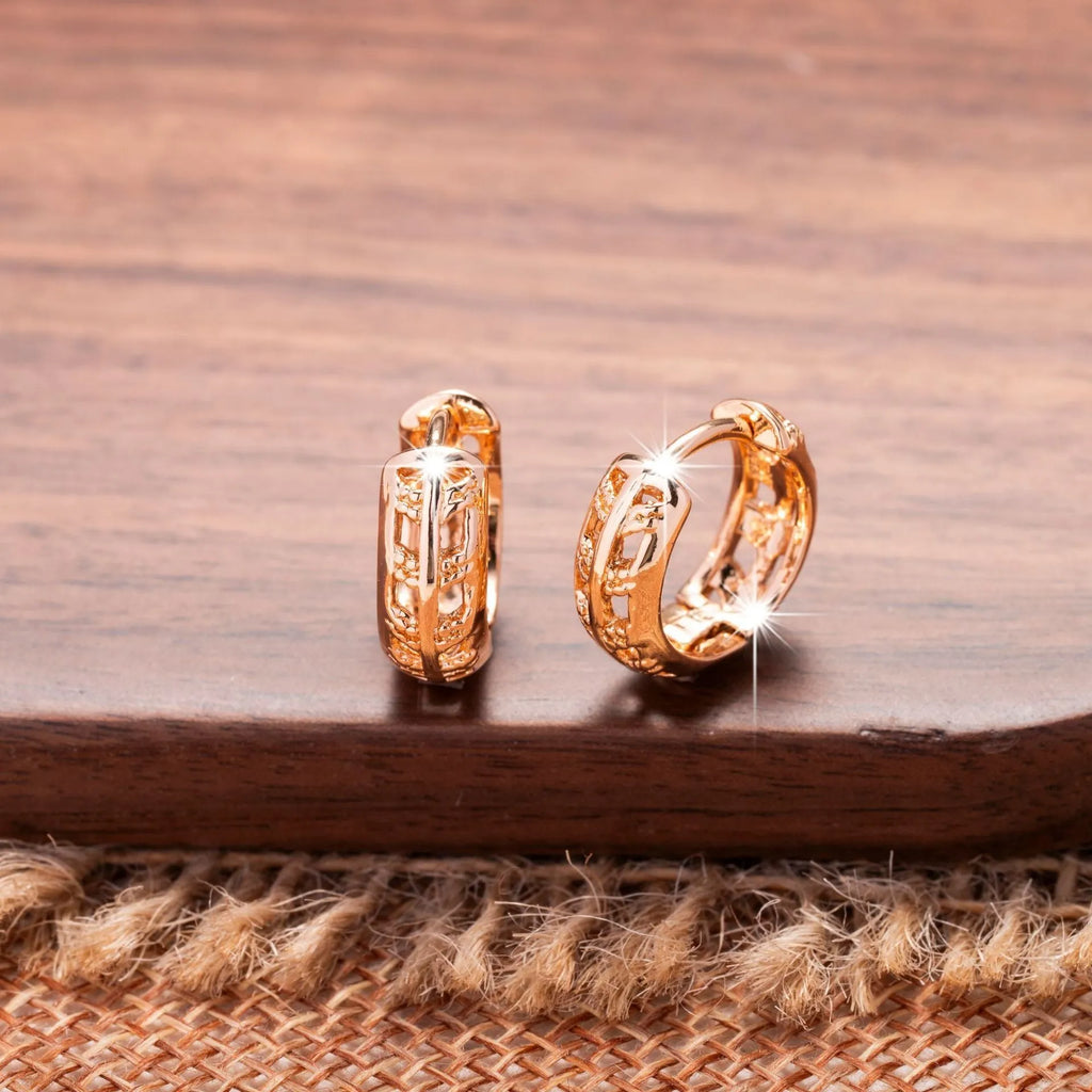 Rose gold hollowed out leaf and heart shaped copper earrings