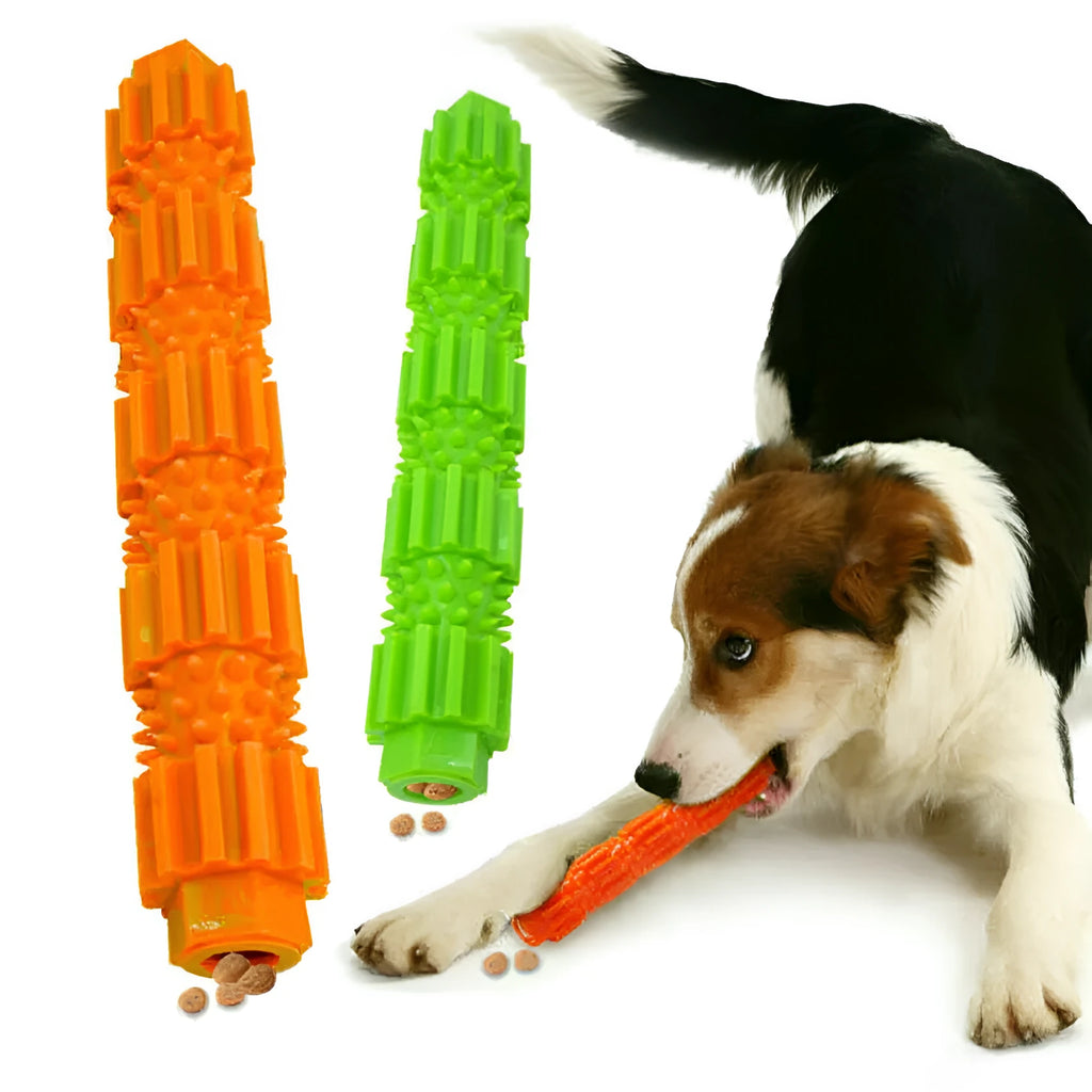 Green durable rubber dog chew toy with treat-dispensing hole and squeaker, for aggressive chewers.