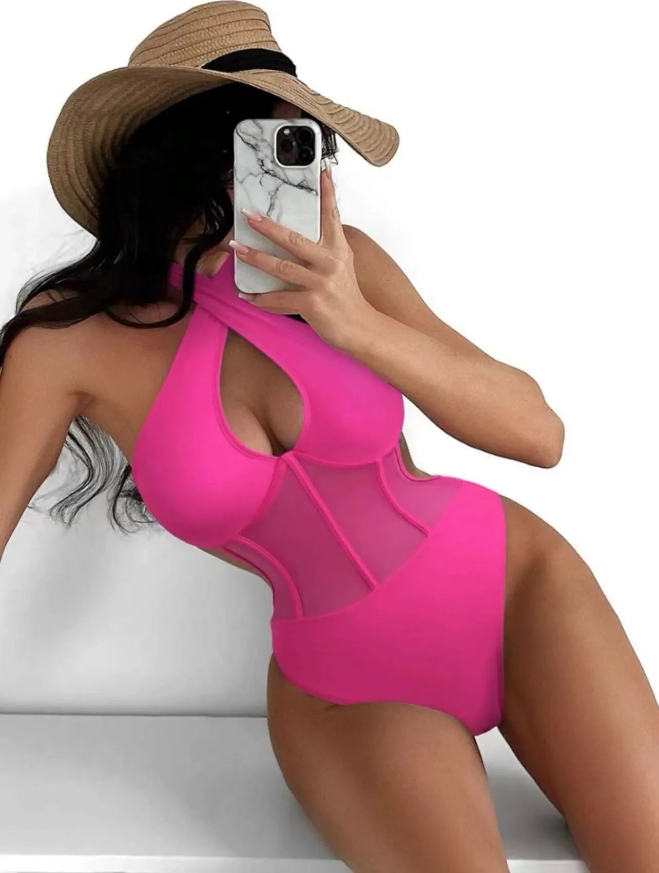 Women's black one-piece swimsuit bikini made from nylon and spandex fabric on a mannequin