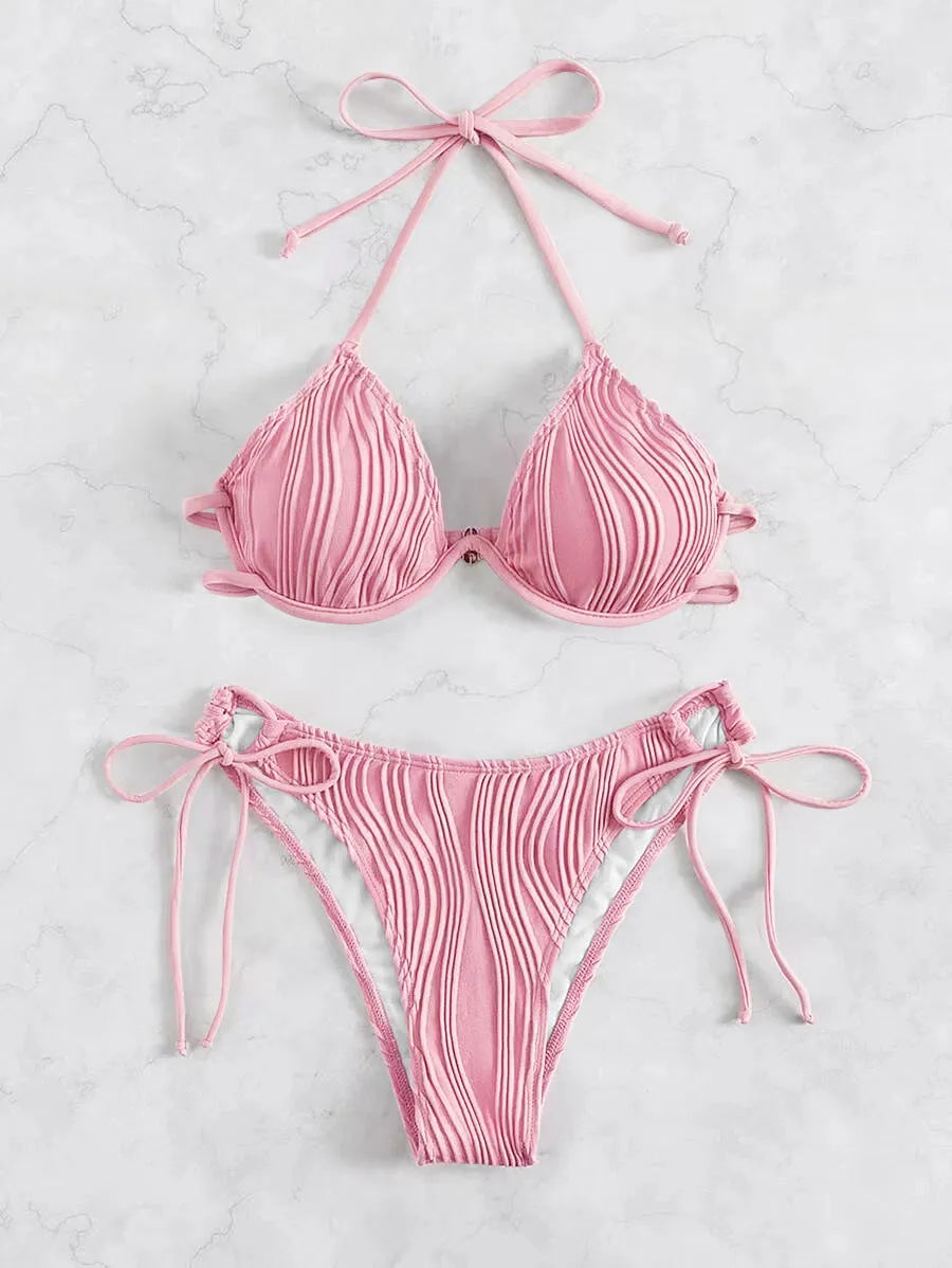 Women's apricot coloured bikini swimsuit with steel underwire bracket on a mannequin.